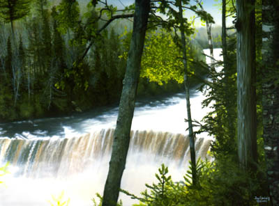 Waterfall crashes down with spray mist between forest at Taquahmenon Falls Michigan